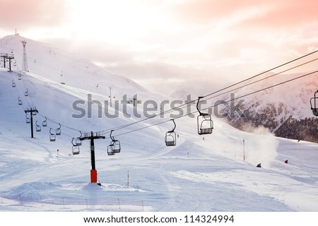 People In A Chairlift At Ski Resort On Sunny Winter Day Stok fotoğraf © Dinga