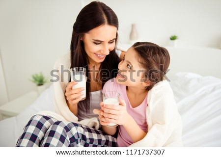 Stock fotó: Woman Drinking A Milk On Bed