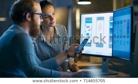 Foto stock: Creative Woman Working On User Interface At Office