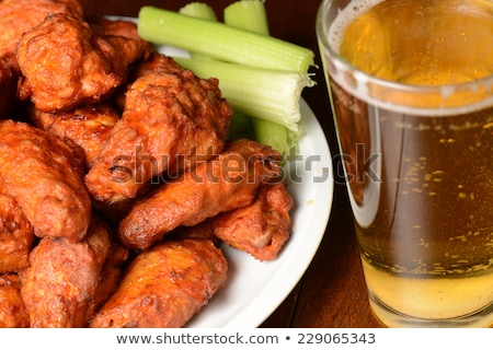 Stok fotoğraf: Hot Chicken Wings And Draft Beer