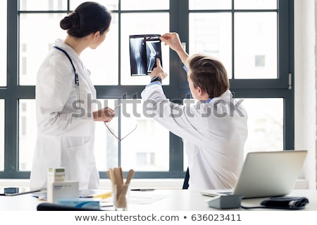 Foto stock: Young Male Doctor With X Ray