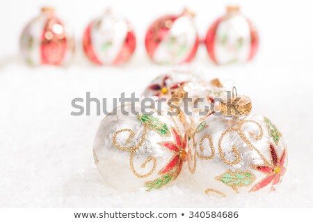 Colourful Hand Painted Baubles On Snow Stockfoto © Calvste