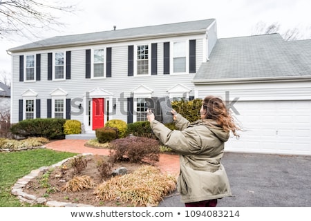 Stok fotoğraf: Winter Damaged Roof Shingles