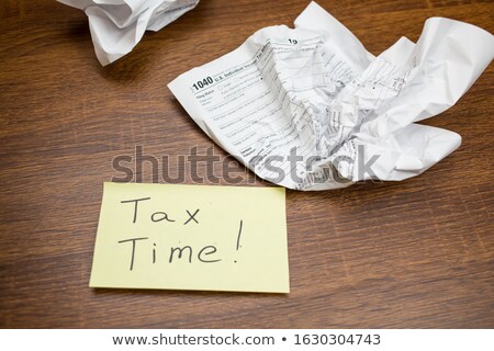 Foto stock: Usa Income Tax Forms Crumpled