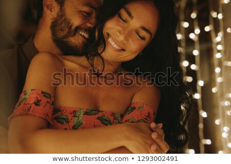 Stock photo: Man Embacing His Woman From Behind