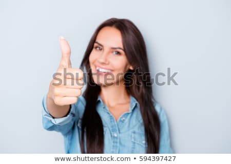 Stock fotó: Pretty Cheerful Business Woman Showing Thumbs Up