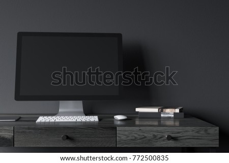 Сток-фото: Laptop On The Black Wooden Desk