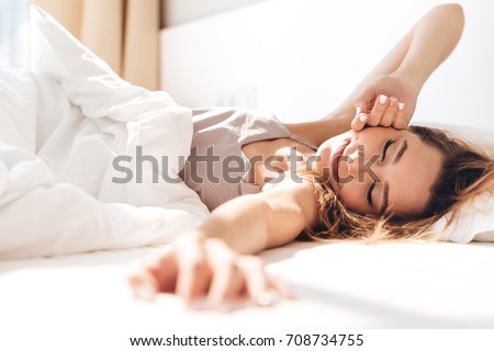 Foto stock: Woman In Bed