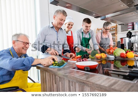 Zdjęcia stock: Nutritionist And Trainees In A Training Kitchen