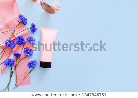 Foto d'archivio: Blank Label Cosmetic Container Bottle As Product Mockup On Pink Silk Background