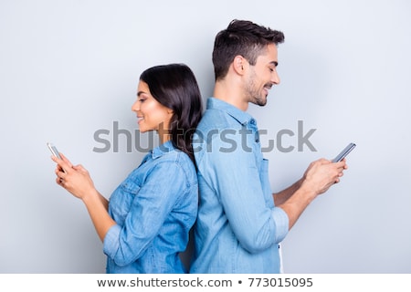 Zdjęcia stock: Lovely Young Woman Sending A Message With Mobile