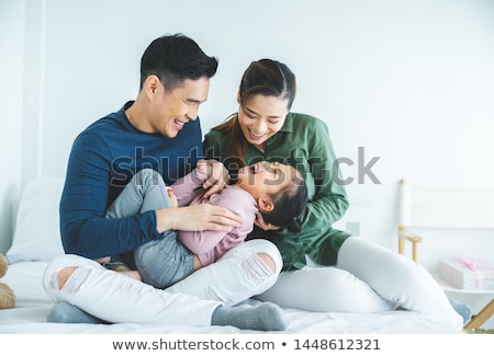 Foto stock: Happy Asian Family Outdoor Fun