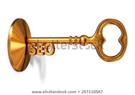 Stockfoto: Seo - Golden Key Is Inserted Into The Keyhole