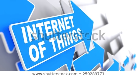 Foto stock: Iot On Blue Direction Arrow Sign