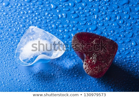 Stock foto: Two Melting Ice Cubes With Water Dew