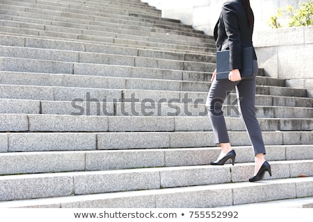 Foto d'archivio: Business Woman Step Up