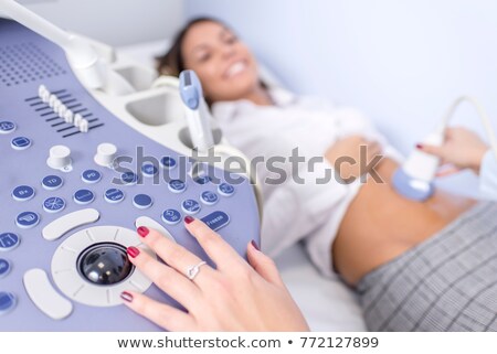 Foto stock: Young Female Patinet Have Ulstrasound Examination Of The Abdomen