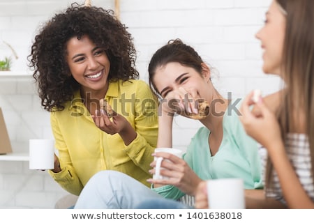 Сток-фото: Three Women Having Tea And Biscuits