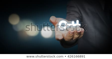 ストックフォト: Man Holding Keys With Connection Concept