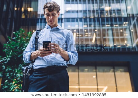 Foto stock: Financial District And Businessman Using Phone