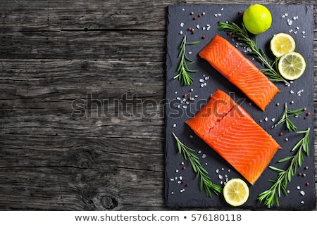 Stock photo: Close Up Of Lemon Slice On Slate Table Top