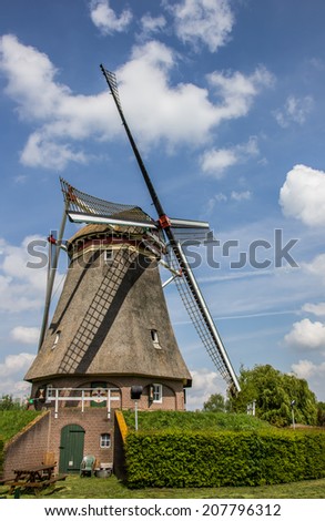 Stock photo: Beatrix Mill In Winssen Against A Blue Sky