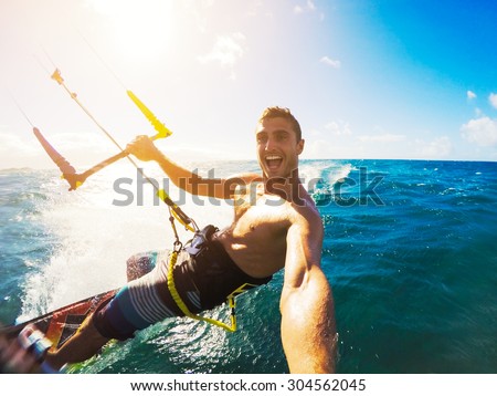 Foto stock: Man Surfing And Splashing To The Camera