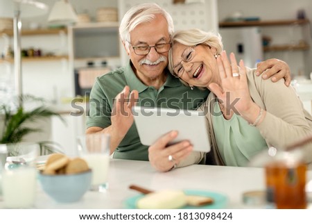 Сток-фото: Seniors With Touchpad