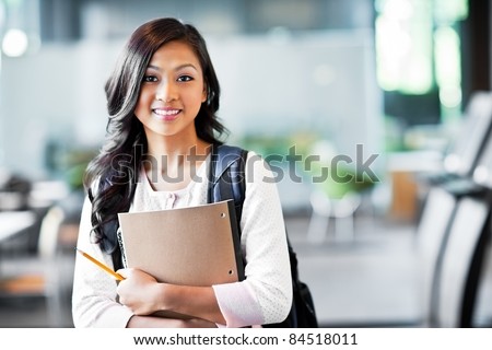 Zdjęcia stock: Pretty Young College Student In A Library