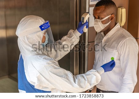 Stock photo: Male Healthcare Worker In Protective Ppe