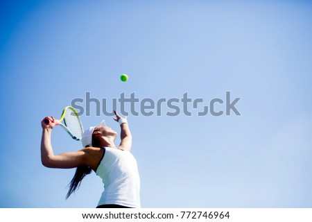 Stock fotó: Beautiful Female Tennis Player Serving