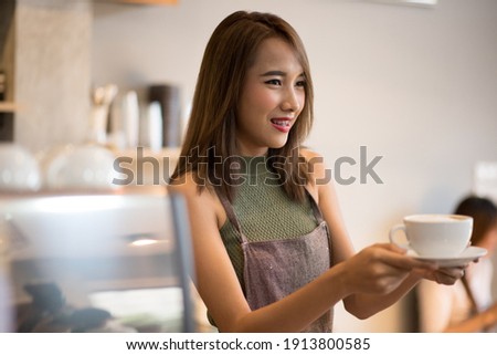 ストックフォト: Beautiful Lively Asian Businesswoman In Restaurant
