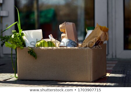 Stock fotó: Delivery During The Quarantine Box With Merchandise Goods And Food At Door Of Home