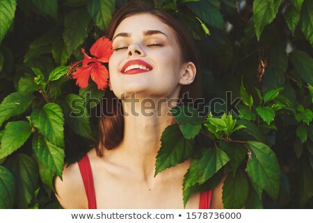 Stok fotoğraf: Woman In The Tropical Garden