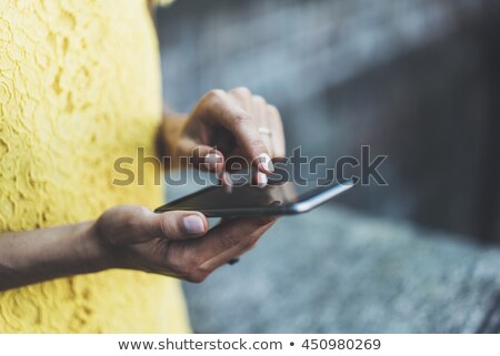Zdjęcia stock: Close Up Of A Caucasian Businesswoman Sending A Text In The Office