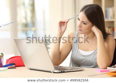 Stock photo: Young Woman With Schoolwork