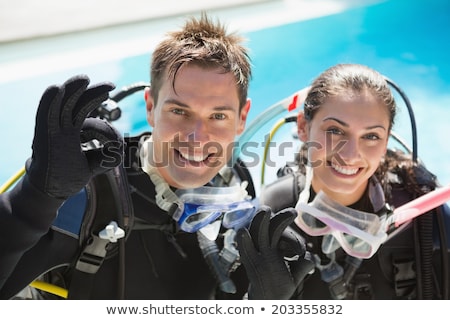 Stock photo: Portrait Of A Handsome Young Man In Diving Suit