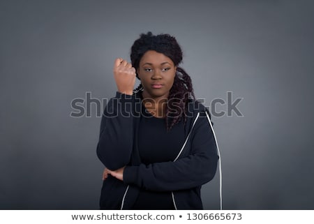 Stockfoto: Beautiful Girl Standing Near Folding Screen