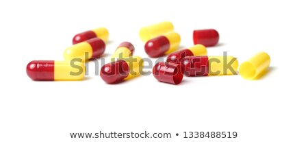 [[stock_photo]]: Apsule · en · jaune · rouge