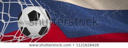 Stock foto: Soccer Ball In Goal Net Against Digitally Generated Russian National Flag