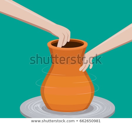 Stock photo: Artist Makes Clay Pottery On A Spin Wheel