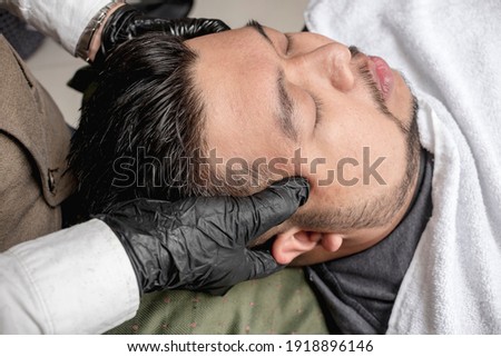 Zdjęcia stock: Indonesian Man Having Wellness Face Massage