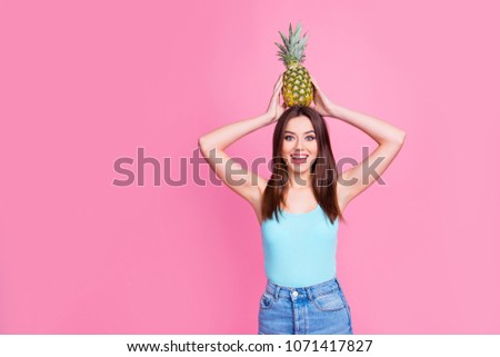 Сток-фото: Young Crazy Girl With Pineapples