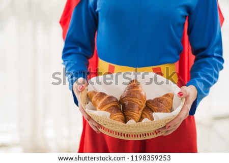 Stok fotoğraf: Superwoman With Croissants