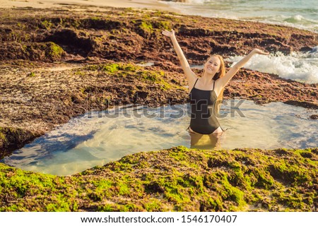 Foto stock: Young Woman Tourist On Pantai Tegal Wangi Beach Bali Island Indonesia Bali Travel Concept