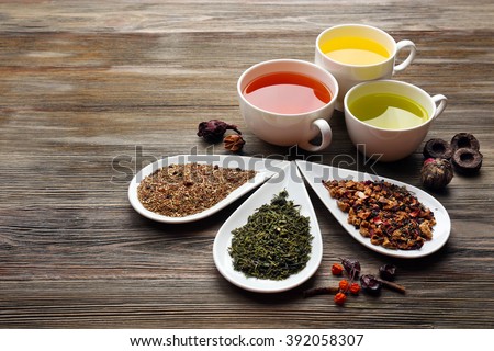 Foto stock: Different Kinds Of Tea In Ceramic Bowls