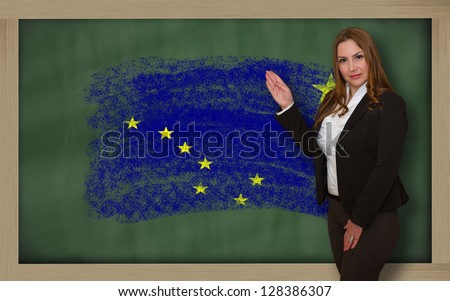 Teacher Showing Flag Ofalaska On Blackboard For Presentation Mar [[stock_photo]] © vepar5