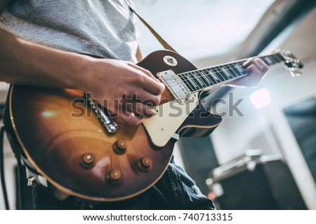 Stock fotó: Musician Playing On Electrical Guitar