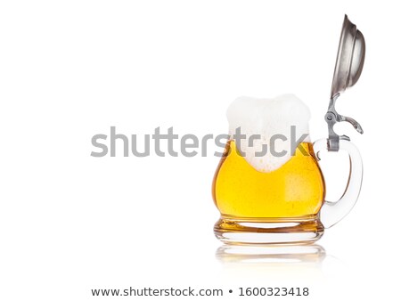 Stockfoto: Vintage Retro Glass Of Lager Ale Beer With Foam Glass Handle With Silver Steel Top