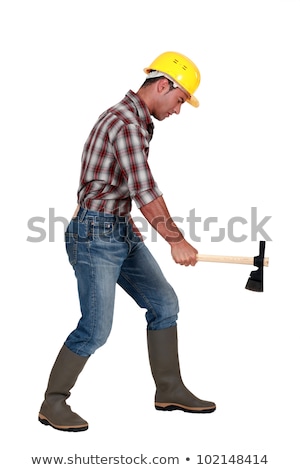 Stock photo: Tradesman Using An Axe